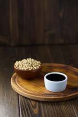 Beautiful soy sauce in a white ceramic bowl