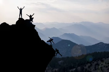 Fototapeten climbing helping team work , success concept © emerald_media