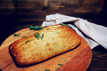 Traditional Italian ciabatta bread with herbs.