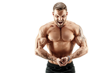 Handsome muscular shirtless man screaming while flexing his musclues isolated on white.