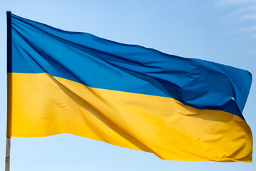 flag of Ukraine against the blue sky