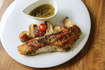 Sea bass fillet on wood background