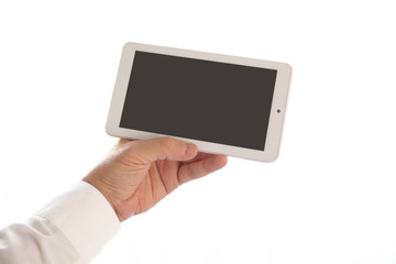 Business man holding and using a white tablet. Empty copy space for Editor's text.