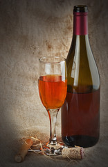 wine bottle and corkscrew