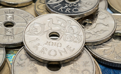 krone coins on banknotes, norwegian money close up