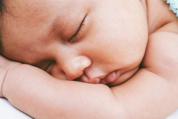 Close Up Portrait Of Sleeping Baby