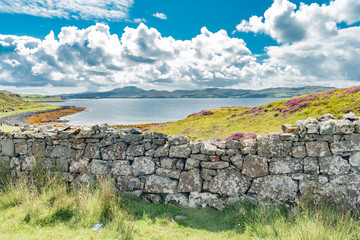 lands between sea and sky with green meadows of Scotland in England