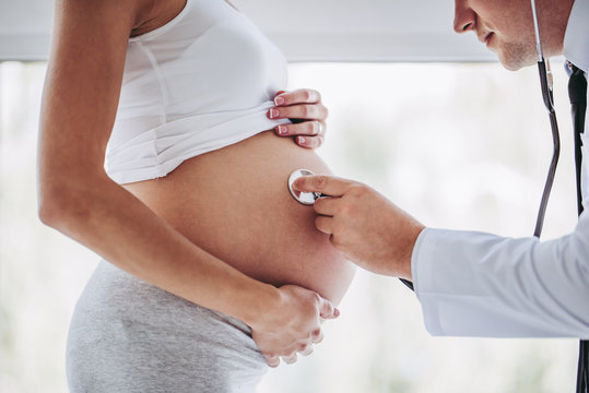 Pregnant Woman With Doctor