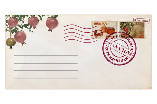 Post envelope with postage stamps and prints. Pomegranates, apples and honey are traditional holiday symbols of  Rosh Hashana - Jewish new year.  Old paper. Vintage style