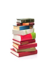 Stack of books on white background