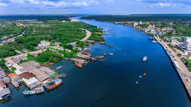 Aerial view of estuary, river and community