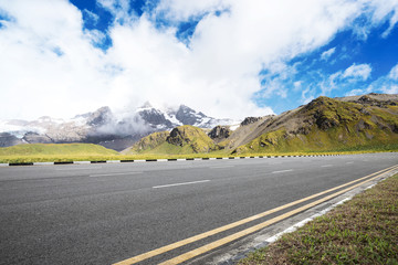 empty asphalt road with beautiful snow mountain