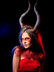 Mad satan woman on black magic ritual of hell. Witch reincarnation mythical creature Sabbath. Devil absorbing soul Halloween. Zodiac Capricorn Aries. Astral entities.