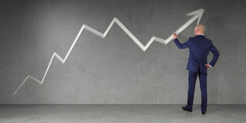 Businessman drawing arrow sketch on a wall 3D rendering