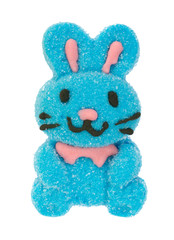 A blue marshmallow candy Easter bunny with black whiskers isolated on a white background.