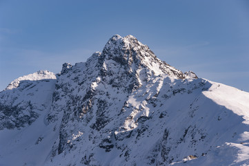 Winter view to the summit of Swinica. High Tatras. Poland.