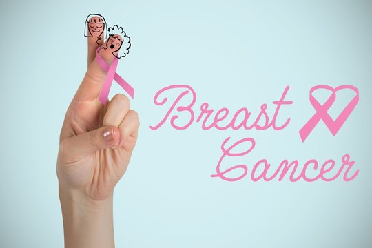 Composite image of breast cancer awareness ribbon on cropped