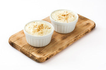 Arroz con leche. Rice pudding with cinnamon isolated on white background
