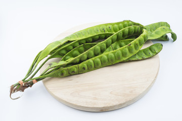 stinking-beans on white background. Also known as Petai in Melaysian and Indonesia, both for the practice of health food