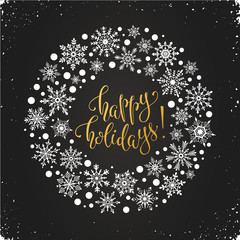 Happy holidays greeting card template. Modern winter lettering with snowflakes on chalkboard. Merry Christmas vector illustration with text.
