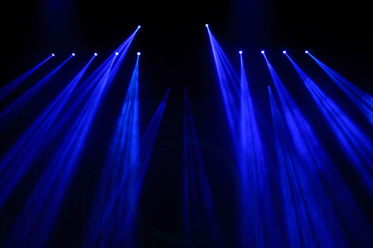 Performance moving lighting on construction light beam ray