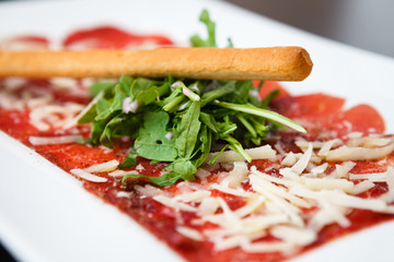 Meat carpaccio with Parmesan