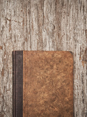 Fototapeta premium Vintage old book on the old wooden background