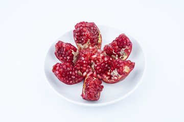 Close up/macro Pomegranates are traditional herbs on isolated white background. Either to make a nutritious drink juice