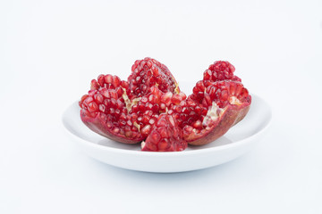 Close up/macro Pomegranates are traditional herbs on isolated white background. Either to make a nutritious drink juice