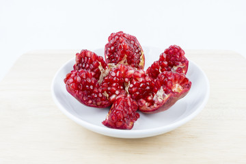 Close up/macro Pomegranates are traditional herbs on isolated white background. Either to make a nutritious drink juice