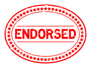 Grunge red endorsed oval rubber seal stamp on white background