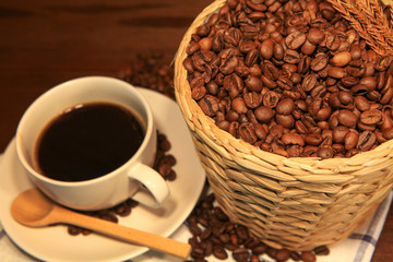 Hot coffee with coffee beans bucket