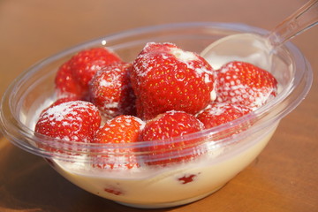 The Strawberry and cream in the translucent bowl, the iconic dessert of Grand Slam Tennis Wimbledon, London, UK.