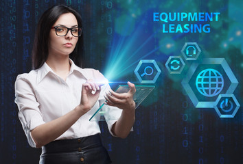 The concept of business, technology, the Internet and the network. A young entrepreneur working on a virtual screen of the future and sees the inscription: Equipment leasing