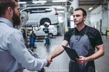 Men in auto service