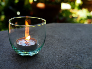 Fire in glass on table