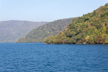 Fototapeta na wymiar Scenic view of lake Towada with small islands, Aomori, Oirase Gorge, Japan