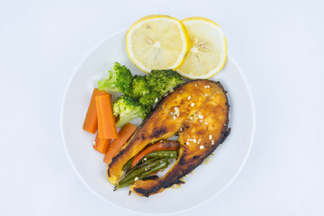 Grilled Salmon with fresh salad and lemon. Selective focus