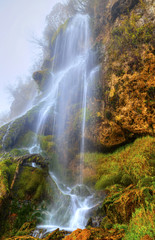 Fototapeta na wymiar Beautiful landscape with mountain waterfall