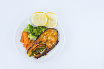 Grilled Salmon with fresh salad and lemon. Selective focus