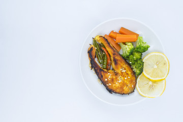 Grilled Salmon with fresh salad and lemon. Selective focus