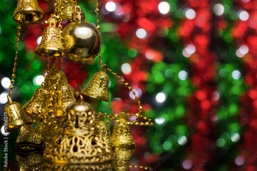 Wall mural christmas decoration on a golden background. bokeh background and dark mirror floor.