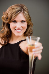 Champagne: Woman Toasting With Glass