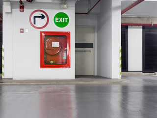 Fire extinguisher with various types of fire extinguishers Located in the fire escape door in the...