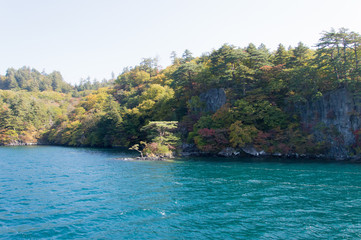 Scenic view of lake Towada with small islands, Aomori, Oirase Gorge, Japan