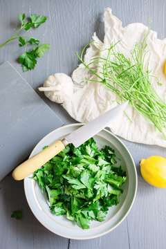 Ingredients for gremolata on a table, seen from overhead.