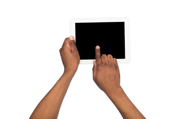 Holding and pointing on blank screen of tablet. Press the button. Point of view