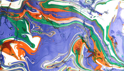 Abstract marble painting background. Bright mixed vibrant colors. Liquid paint.