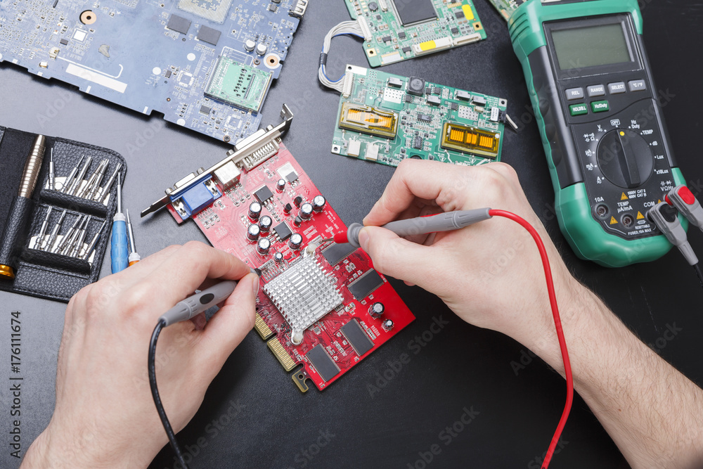 Poster electronic circuit red board inspecting close up