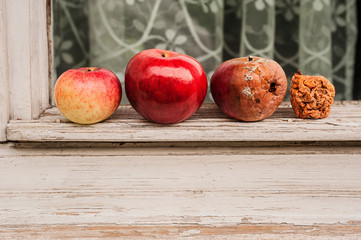 four apples: an acerbic, a mature, an old, a march